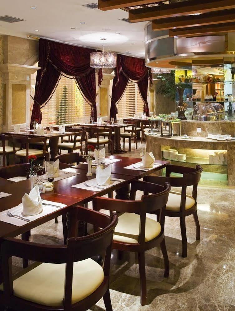 New Paris Hotel Харбин Экстерьер фото